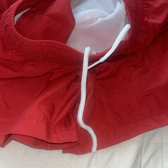 Gently use men’s polo size. Small shorts. - Picture 5 of 6